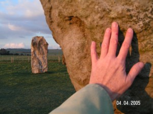AK's hand touches Avebury standing stone